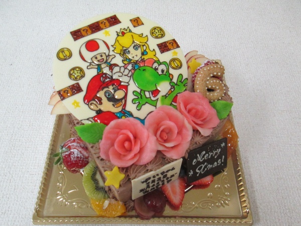 クリスマスケーキに マリオとピーチ姫 ブロックやコインもプレートで バラもトッピング 大阪市東住吉区 パティスリーデコ
